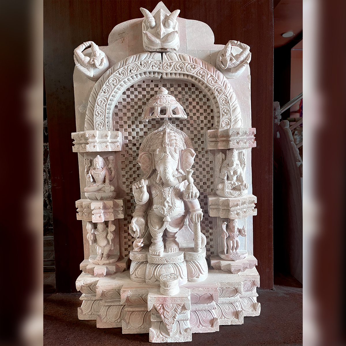 Lord Ganesha mesh detail Pink Stone Statue Utkalika Odisha