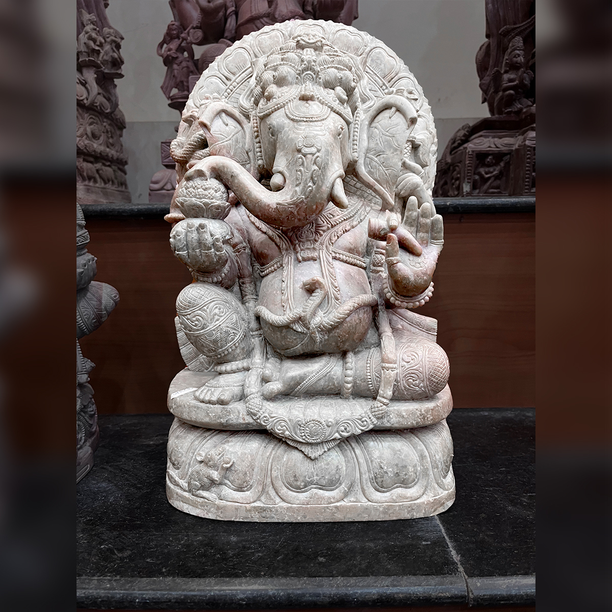 Lord Ganesha idol with broken finger Pink Stone Statue - Utkalika Odisha